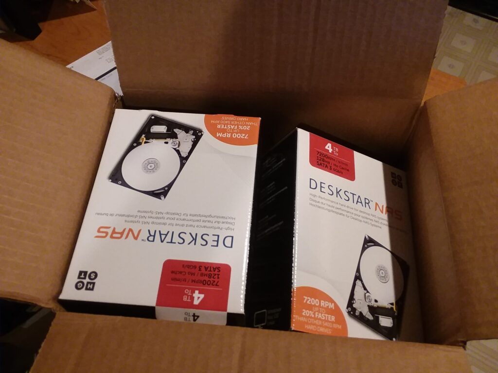 Box of four 4TB HGST drives
