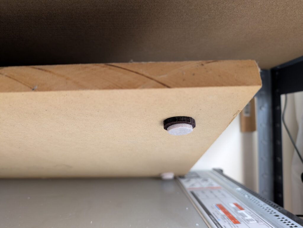 Felt feet provide another little bit of isolation between the materials and allowing a touch of airflow.