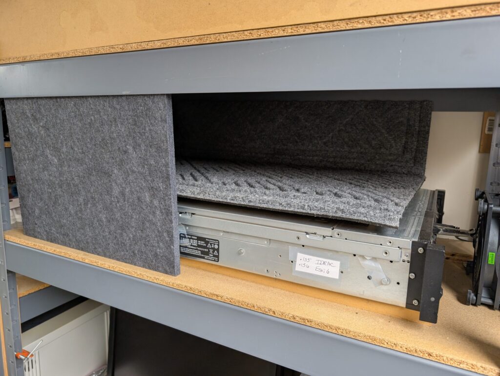 The first felt acoustic panel goes into place.