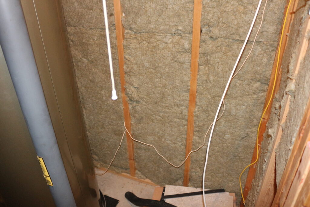 After: Rockwool mineral wool installed between the studs. One of my earliest—and most effective—noise reduction projects.