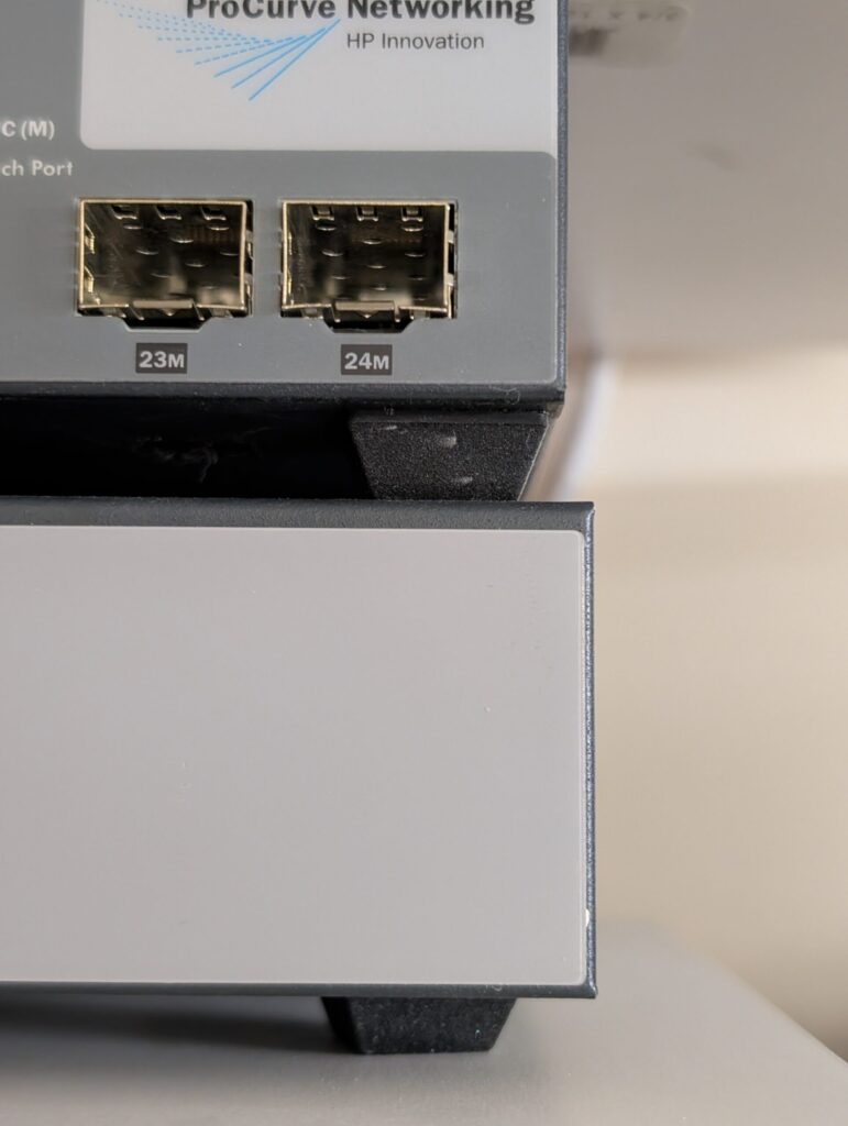 Rubber feet under the two switches
