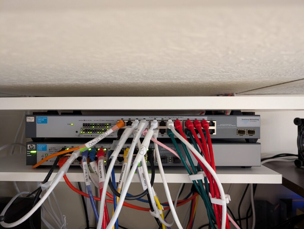 Switches also get feet to allow for cooling- note fan at the far right that is blowing fresh air at them